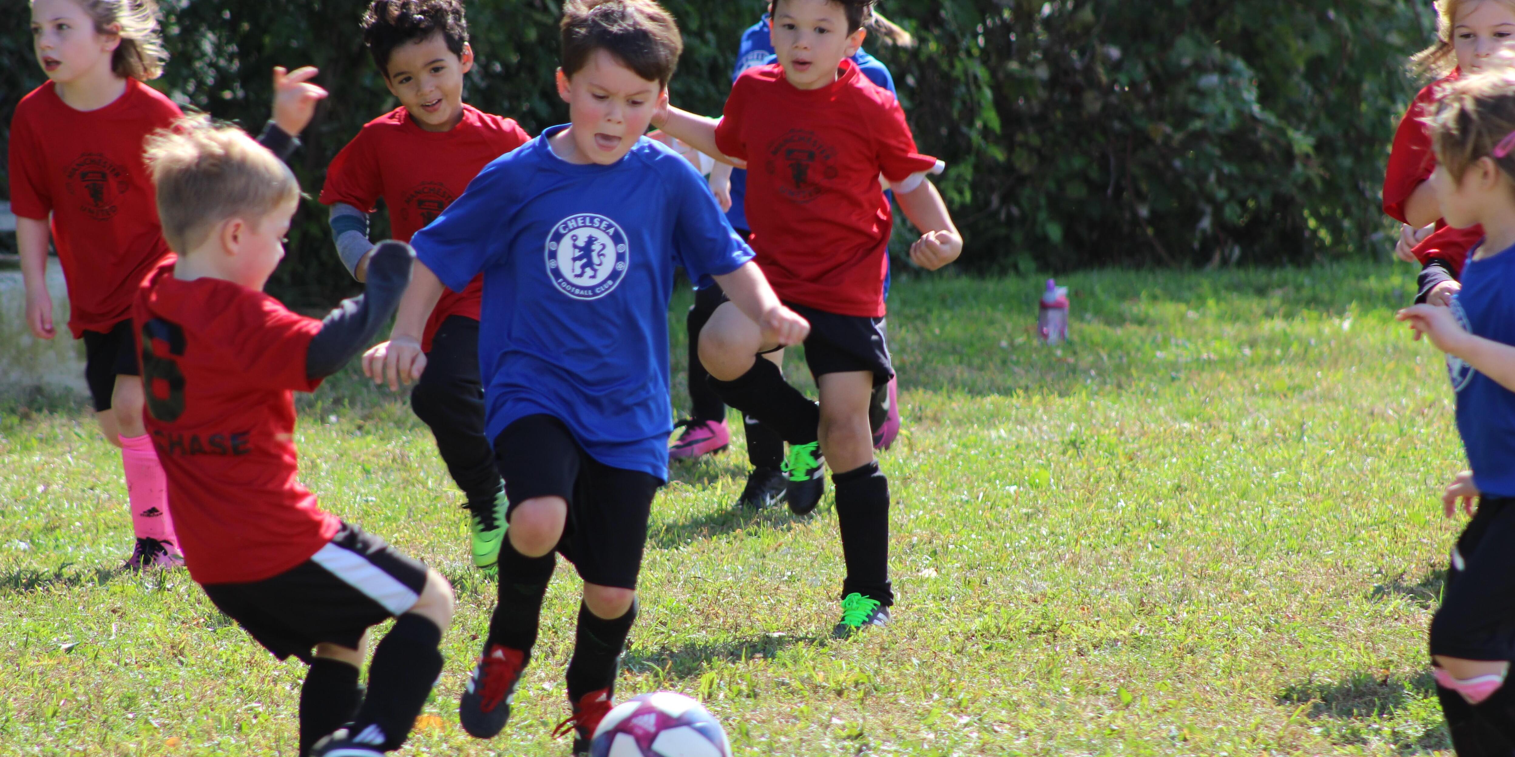 Children playing soccer