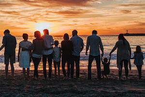 family standing on beach