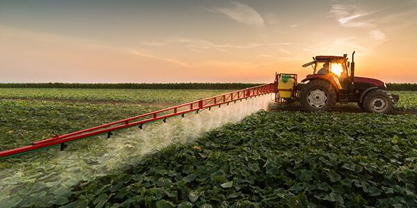 tractor spraying pesticides