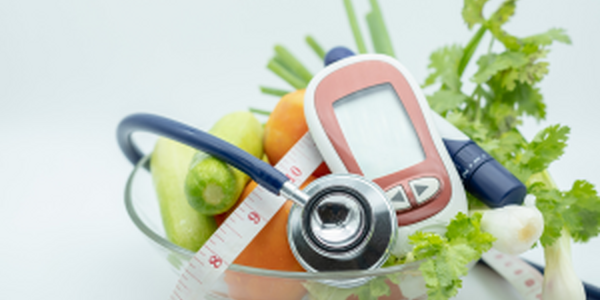 vegetables with diabetes monitor and stethoscope 