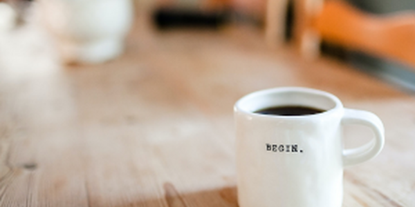 White coffee mug on wood table